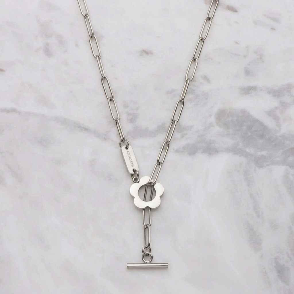 Essence necklace in silver on marble