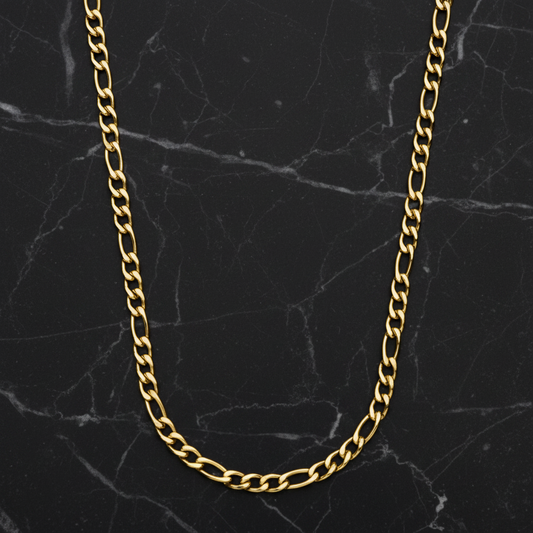 Gold chain on a black marble background