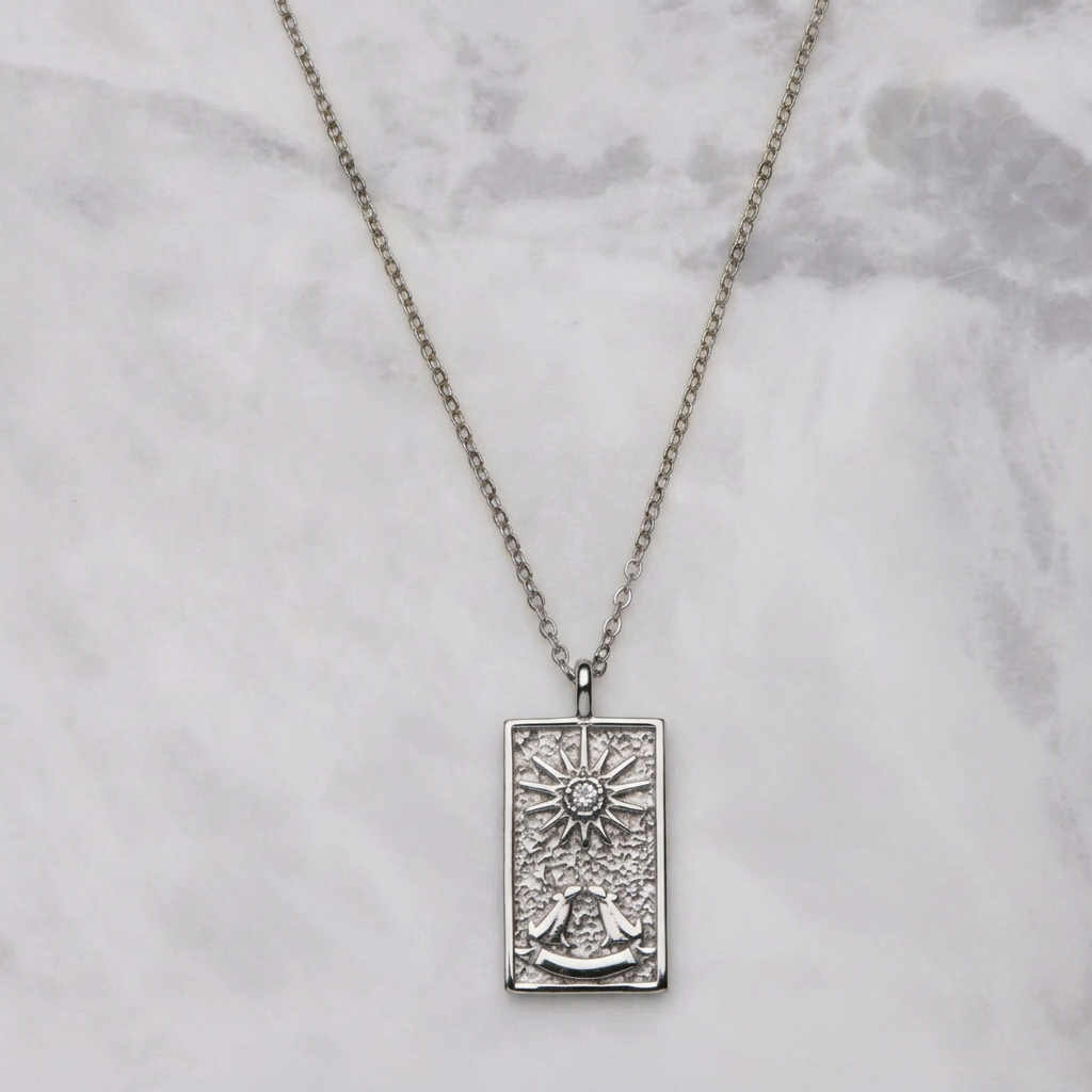 Lumina necklace in silver on marble