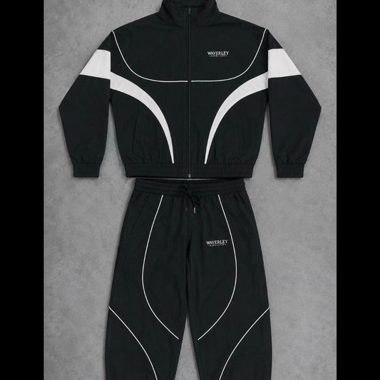 Black tracksuit with white accents on a gray background